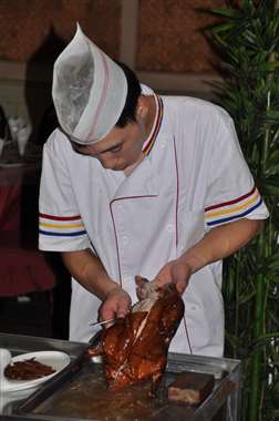 Het aansnijden van de Peking Eend