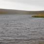Grijze luchten boven het Loch of Brough voorspellen weinig goeds